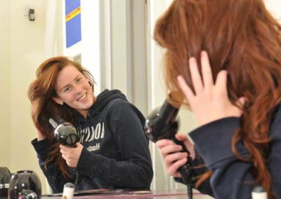 Hostel Girl with hairdryer